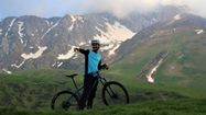Rémi Couderc sur l'un de ses Vtt en montagne
