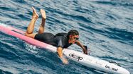 Photo de Alexandra Lux sur son paddle au large de Monaco
