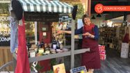 Dominique Dejean devant sa boutique des Fantaisies Gasconnes.